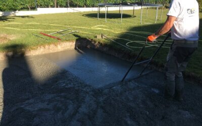 Création dalle béton pour piscine 37140